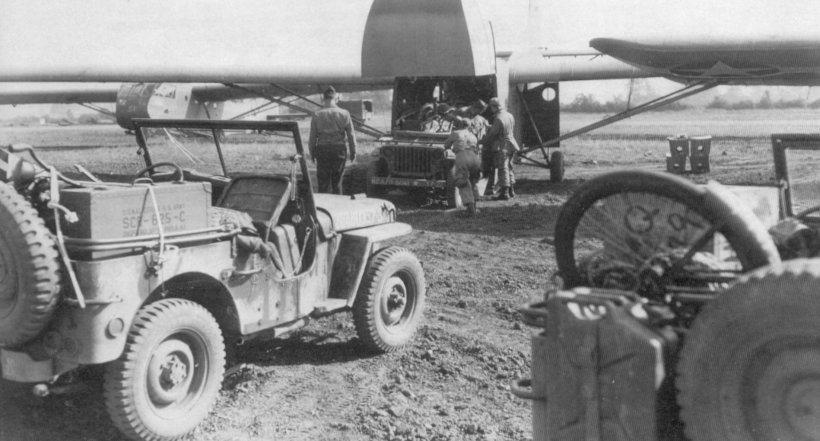 82nd Airborne Division loading Jeeps into Waco CG-4A gliders about Sep 14, 1944 for Market Garden on Sep 17. The box in the left Jeep is a SCR-625-C mine detector and a paratrooper bicycle is in the right Jeep