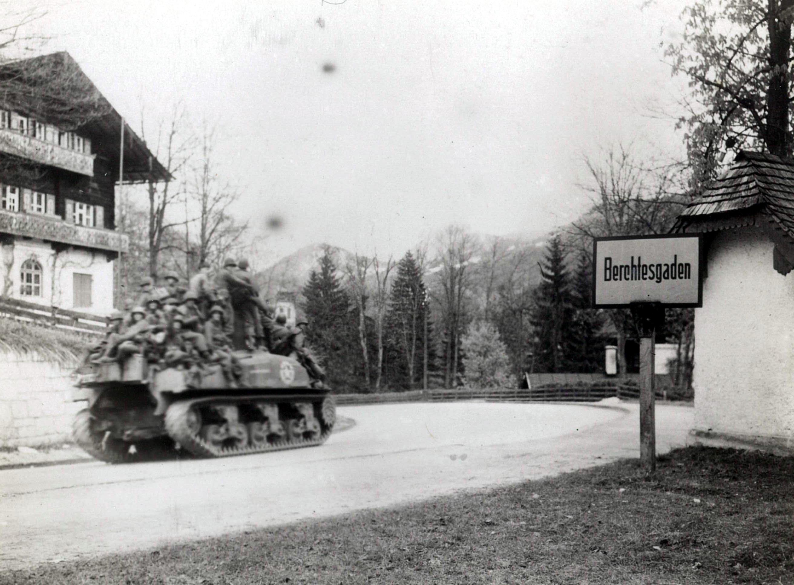 An M4 Sherman tank and men of the 3rd Infantry Division entering Berchtesgaden, Germany, May 4, 1945