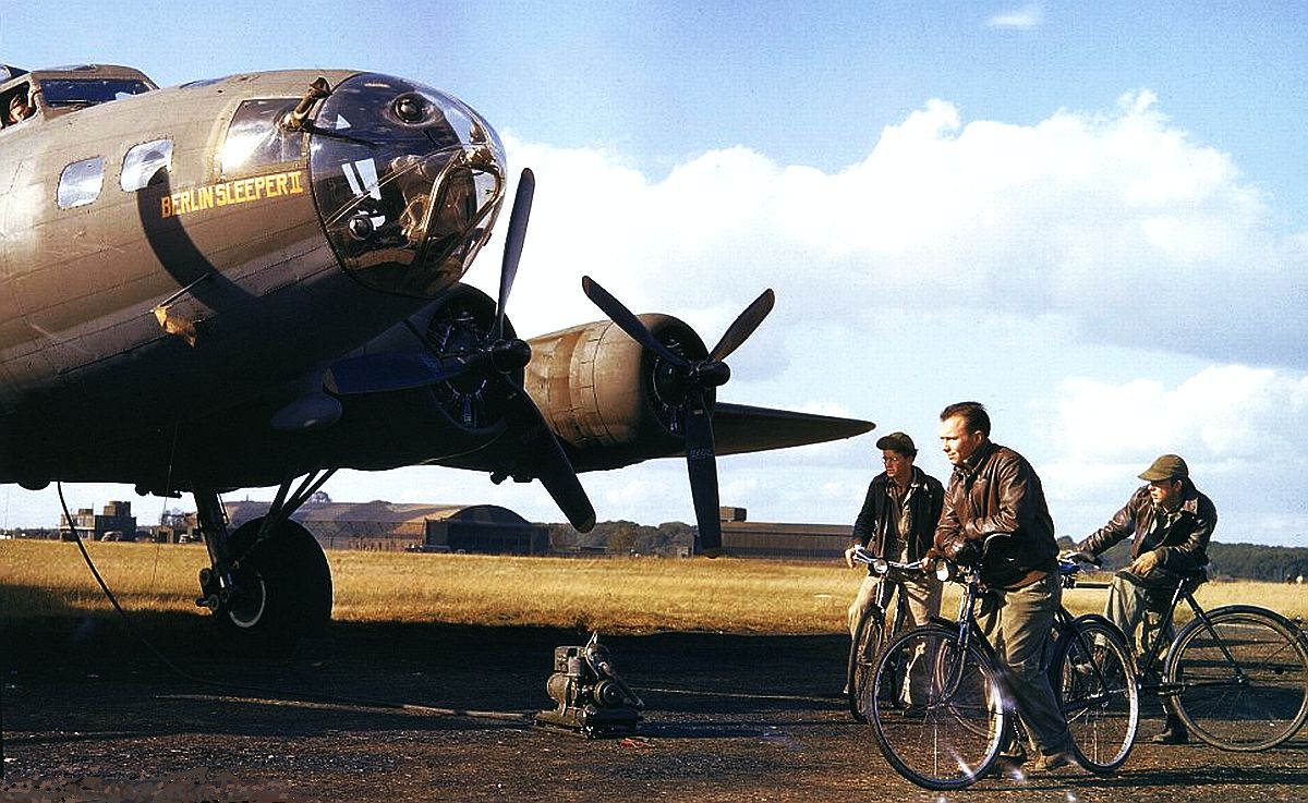 Groundcrew members tending to B-17F Fortress 