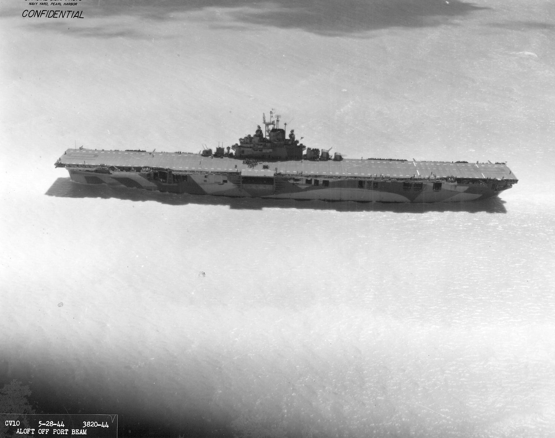 USS Yorktown (Essex-class) in the channel leaving Pearl Harbor, Hawaii, 29 May 1944.