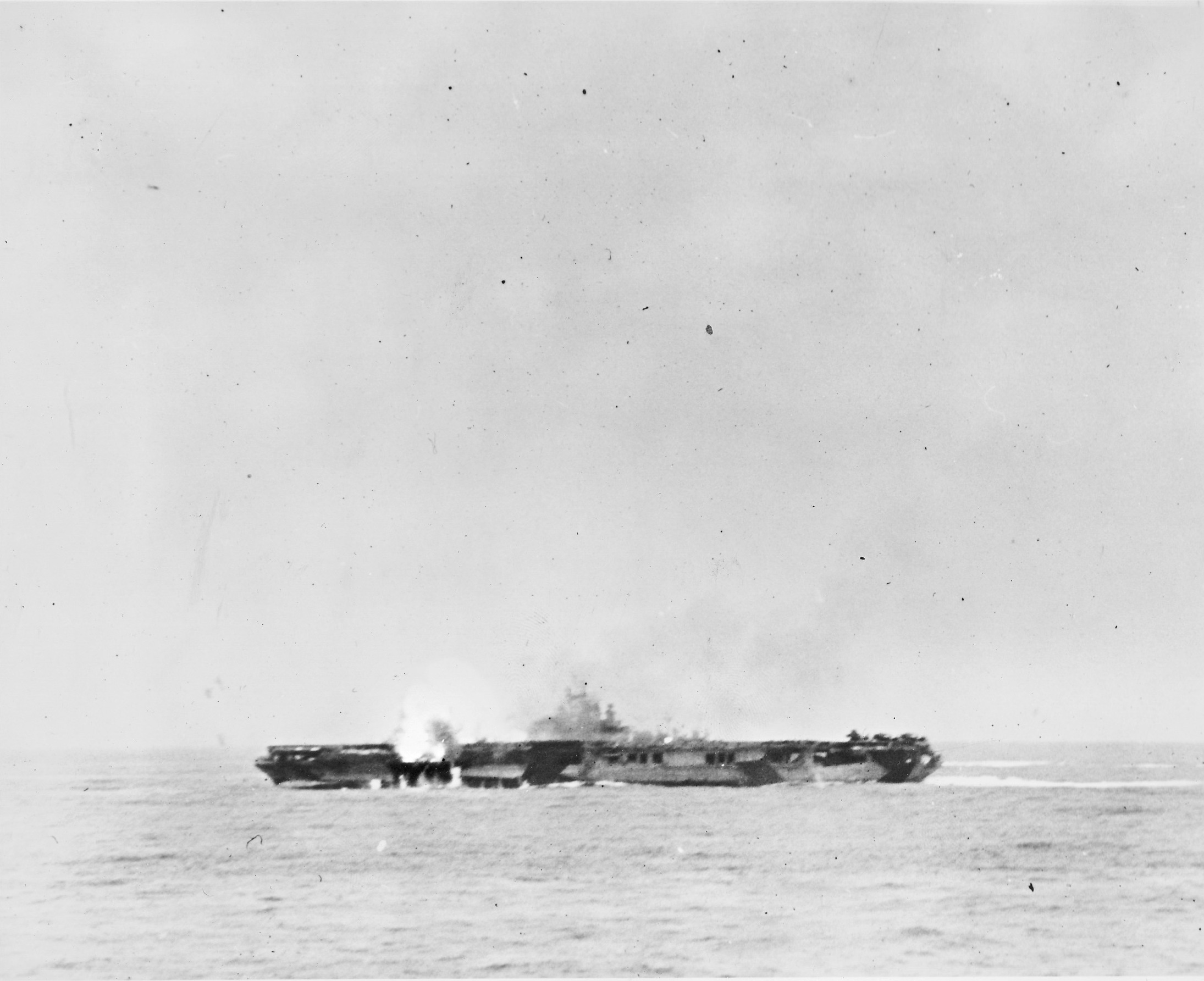 A Japanese special attack aircraft exploding on the deck of USS Hancock off Okinawa, Japan, 7 Apr 1945
