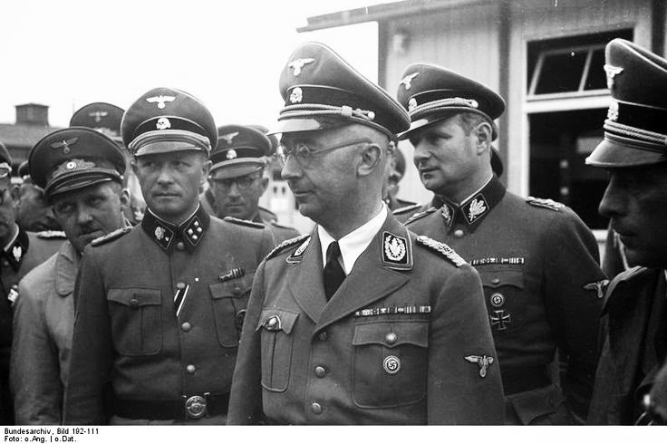 Reich Commissioner Heinrich Himmler and his entourage on a tour of the Mauthausen concentration camp in Austria, 27 Apr 1941