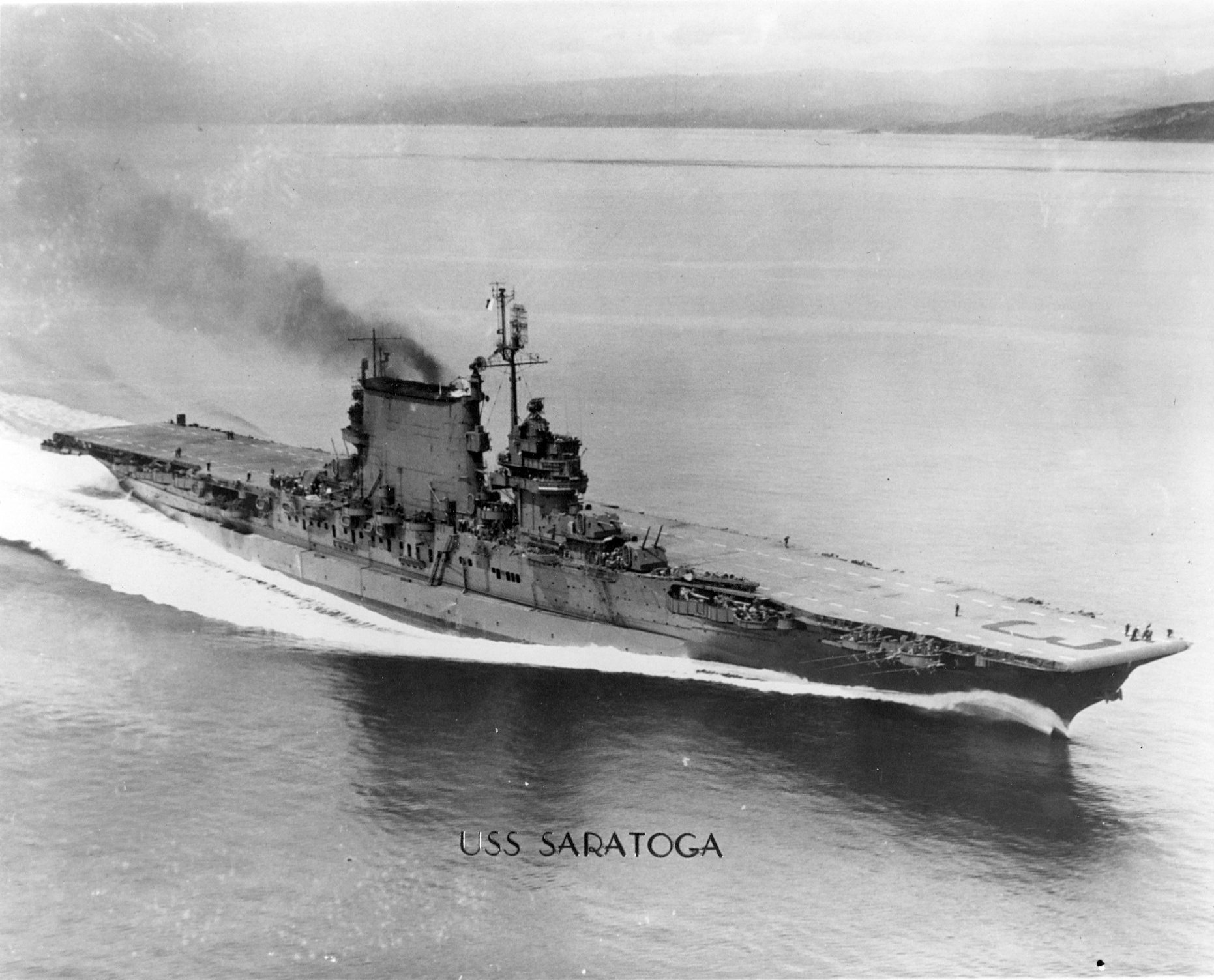 Saratoga running full power trials in Puget Sound, Washington, United States, following battle damage repairs, 15 May 1945. Photo 2 of 2.