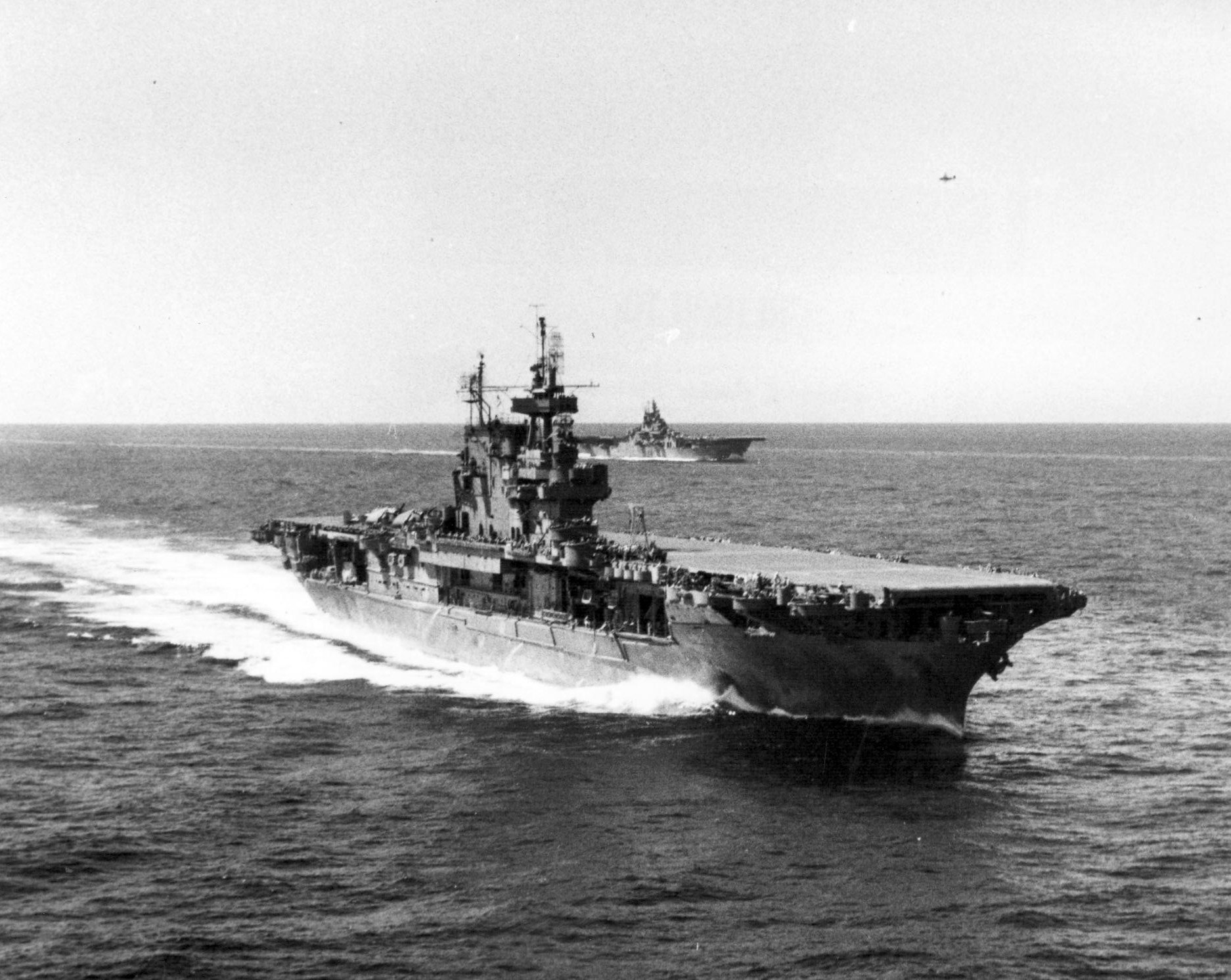 USS Enterprise steaming in company with USS Lexington (Essex-class) off the Mariana Islands, Jun 1944.