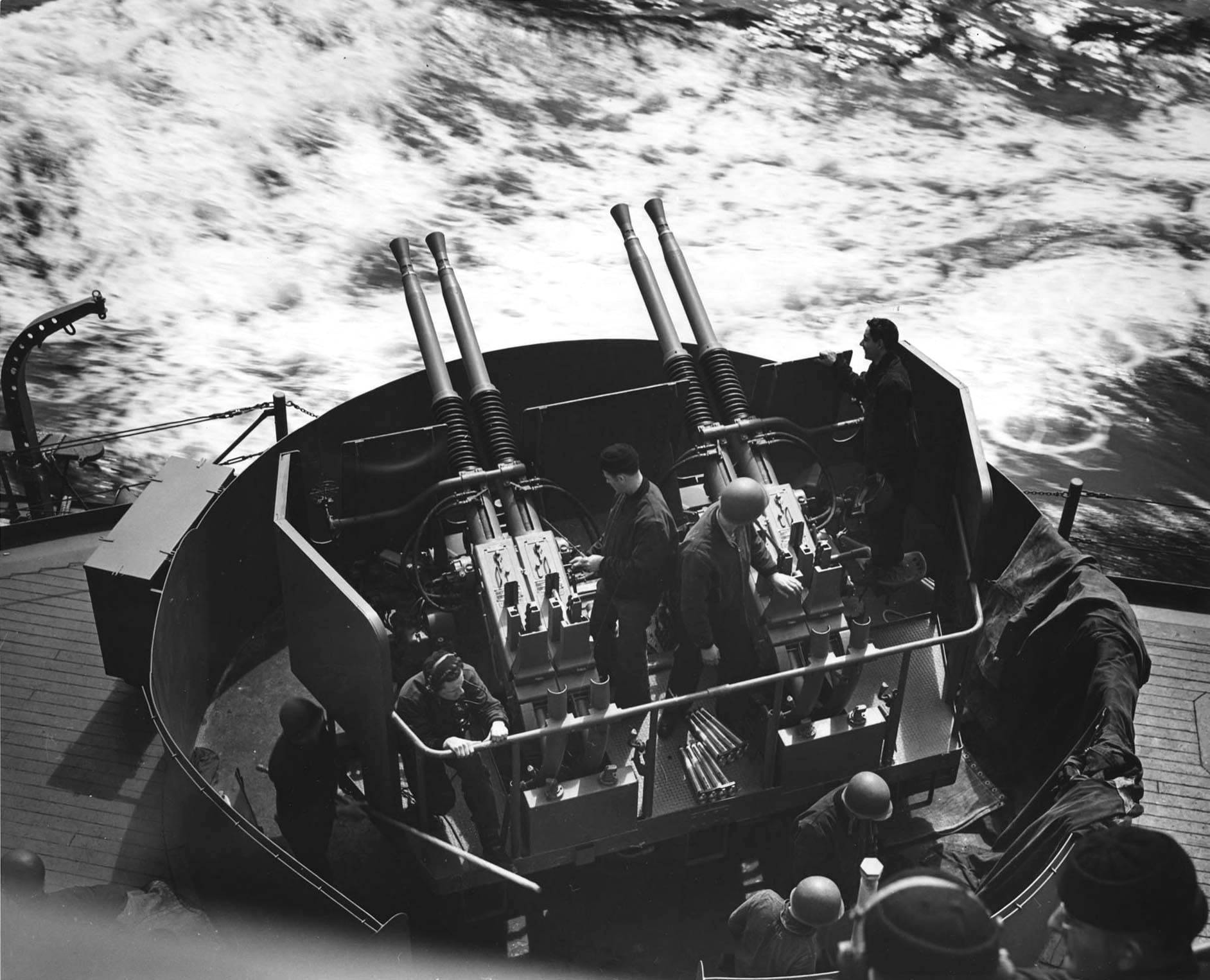 Gun crews aboard USS South Dakota man their 40mm Bofors anti-aircraft guns during the Battle of Santa Cruz Islands, 26 Oct 1942