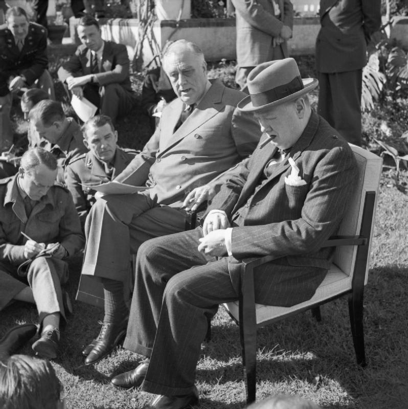Franklin Roosevelt and Winston Churchill brief war correspondents in the gardens of Roosevelt’s Villa Dar es Saada in the Anfa neighborhood of Casablanca, French Morocco during the Casablanca Conference, 24 Jan 1943.