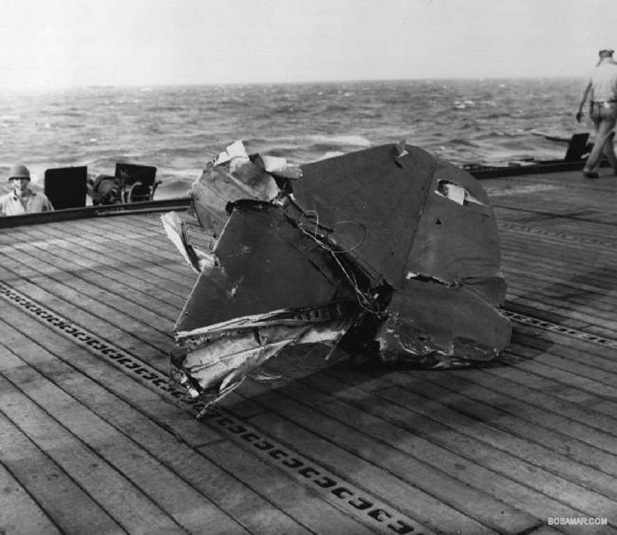 Tail section of a D4Y Suisei ‘Judy’ dive bomber that landed on the flight deck of Escort Carrier USS Kitkun Bay after being exploded in flight by intense anti-aircraft fire during the Battle off Samar, 25 Oct 1944