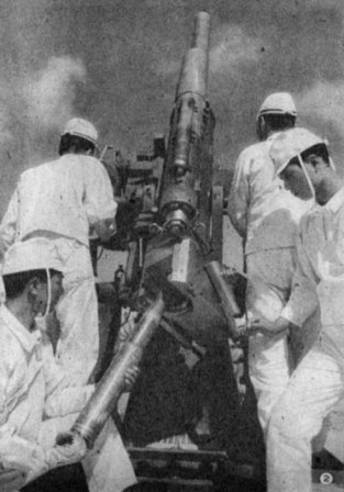 Japanese Navy 8-centimeter Type 3 anti-aircraft gun and crew, circa 1940