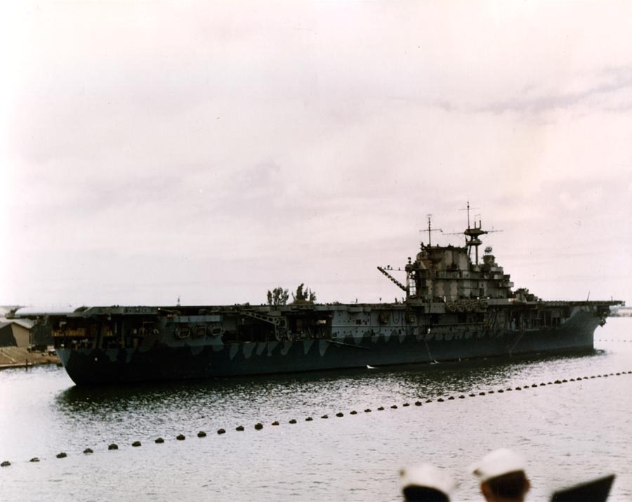 USS Hornet (Yorktown-class) at Pearl Harbor, Territory of Hawaii June or July 1942 after the Doolittle Raid. Note the distinctive early “dazzle” paint scheme.