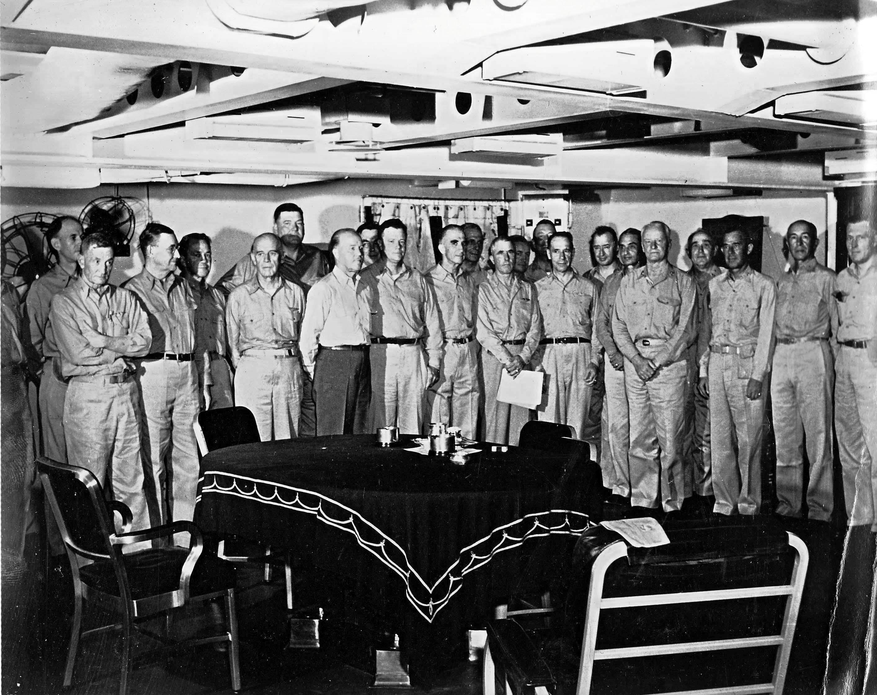 Newly promoted Fleet Admiral Chester Nimitz hosting a collection of Third Fleet flag officers aboard battleship USS New Jersey in Ulithi Lagoon, Caroline Islands, Christmas Eve, 1944.