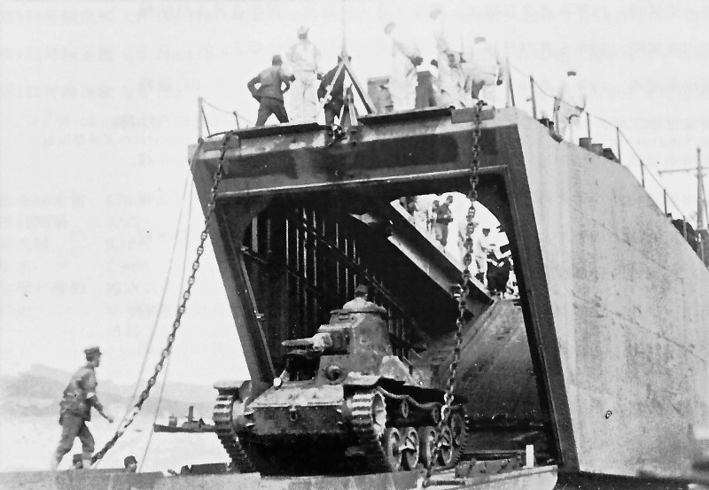 Japanese landing ship No. 149 loading a Type 95 Ha-Go light tank, Nasake Island, Kure, Japan, 27 Feb 1944