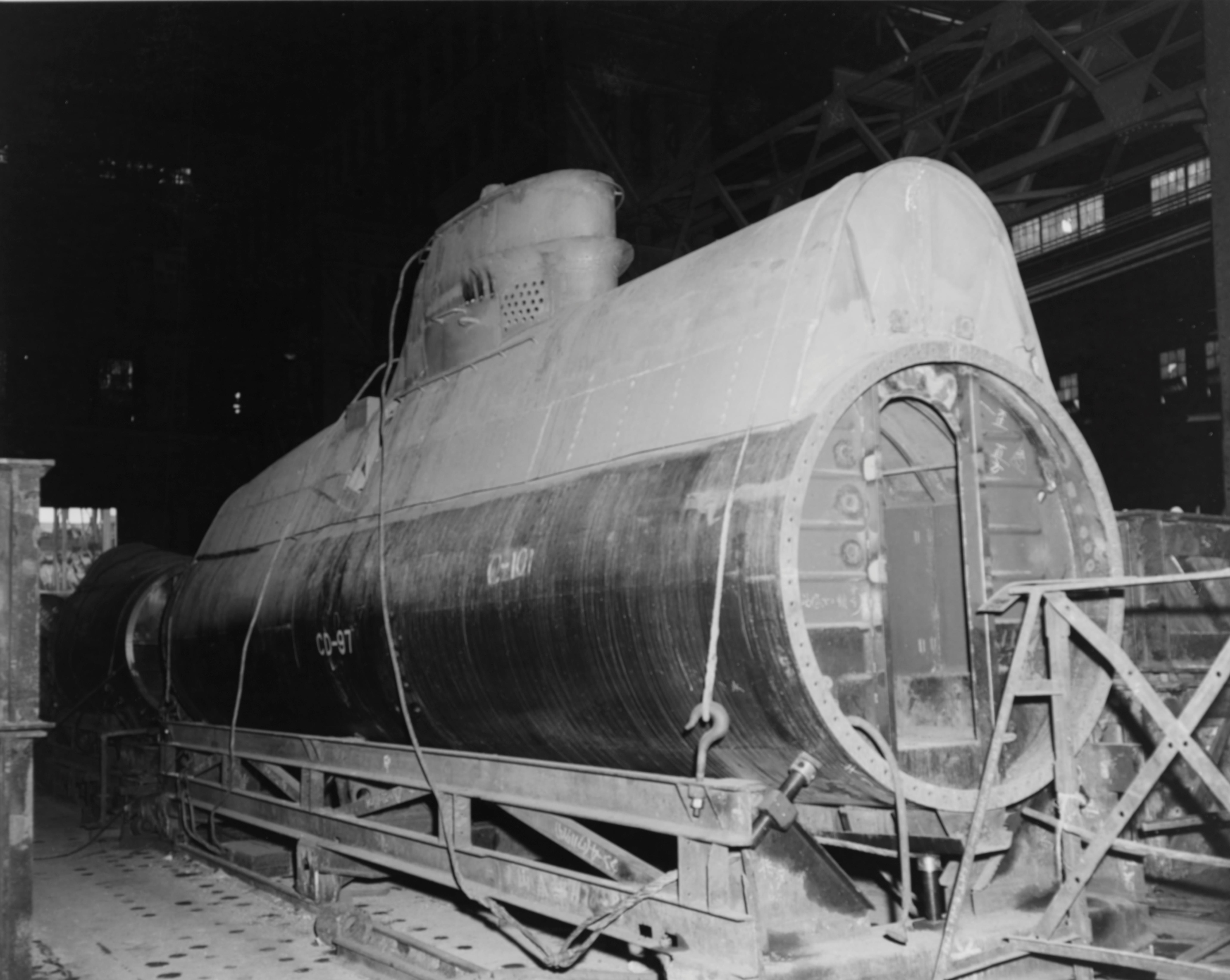 Post-war American photo of Japanese Koryu Type-D midget submarine mid-bodies in a production facility at Kure, Japan, 19 Oct 1945.