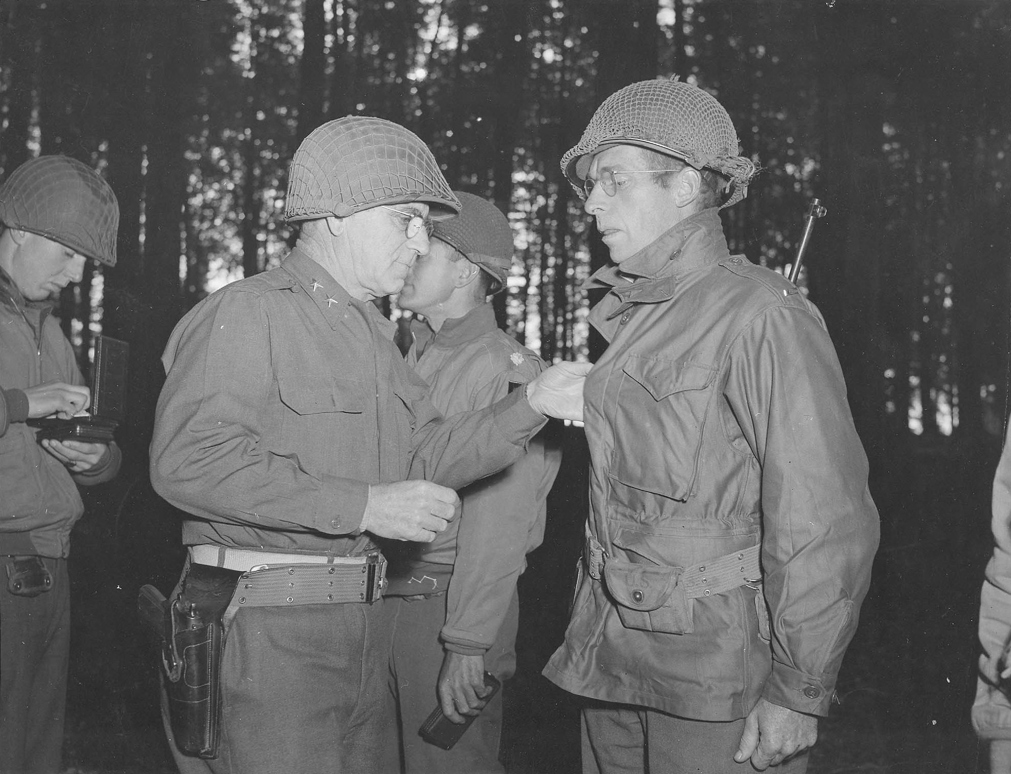 MGen Leonard Gerow presenting the Distinguished Service Cross to 1st Lt William J Kehaly of San Francisco, California on 11 Sep 1944 for Lt Kehaly’s actions on D-Day, 6 Jun 1944.