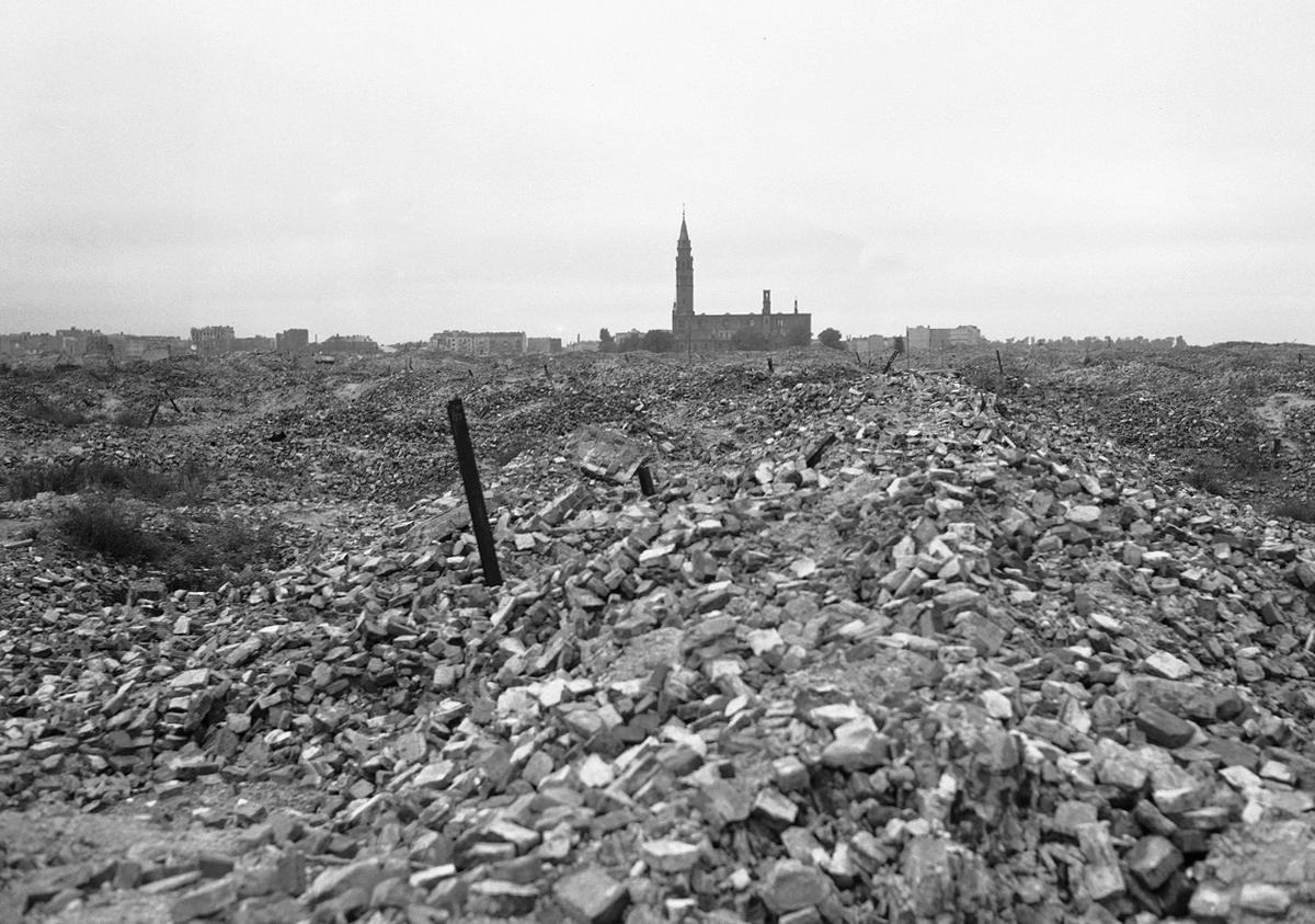 Rubble of the Warsaw Ghetto after the Germans dynamited it to the ground following the Warsaw Ghetto Uprising, late 1943. Note St Augustine’s church tower.