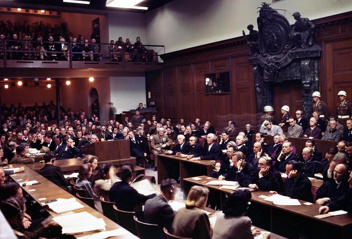 Courtroom interior, Nuremberg, Germany, early 1946. Note Göring, Heß, Ribbentrop, Keitel, Kaltenbrunner, Dönitz, and Raeder in the dock at right.