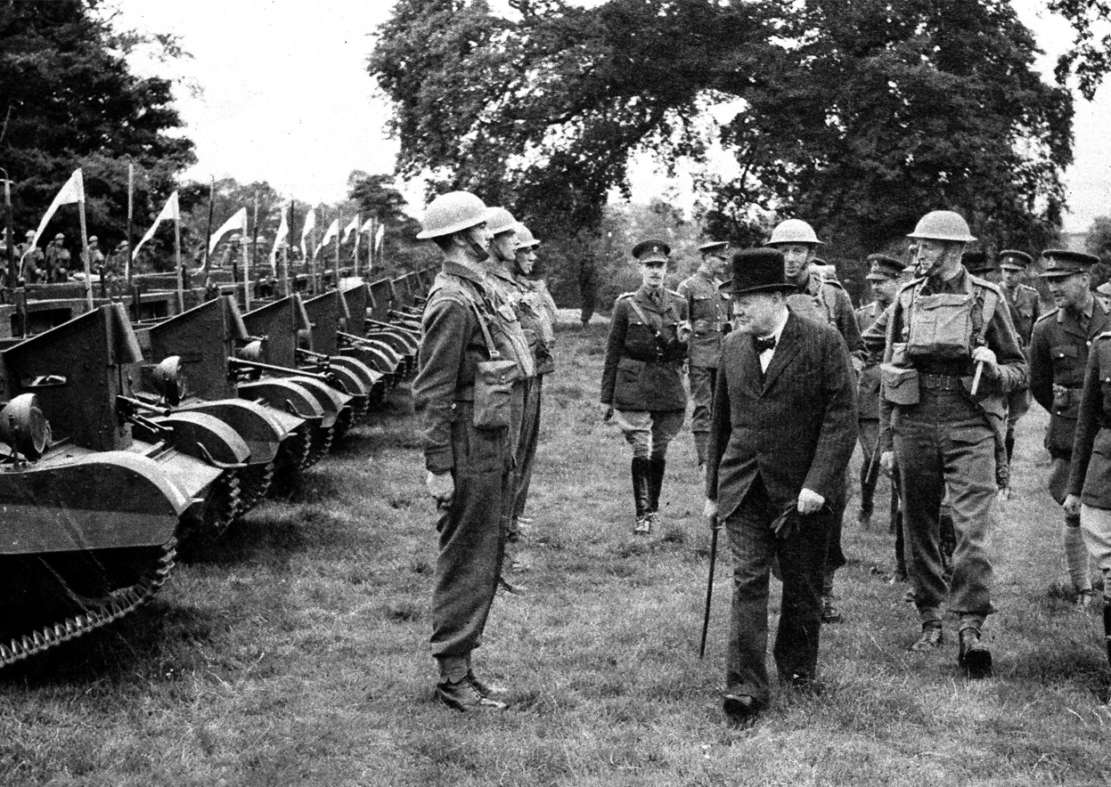 Winston Churchill inspecting a formation of Bren Gun Carriers, Britain, Jul 1940.