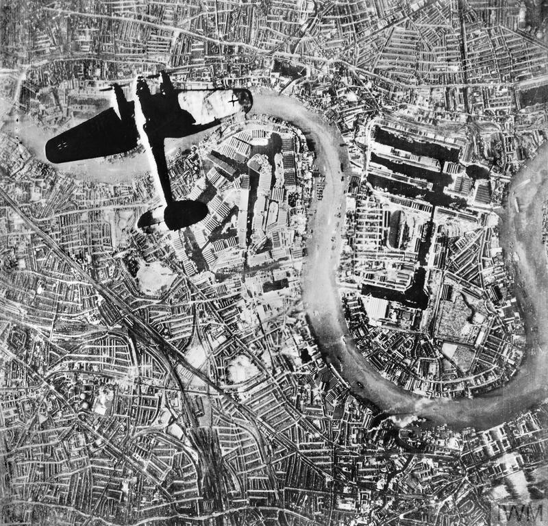 German He 111 bomber in flight northbound over Surrey Docks, London, England, United Kingdom at 1700 hours on 7 Sep 1940, photo 2 of 2