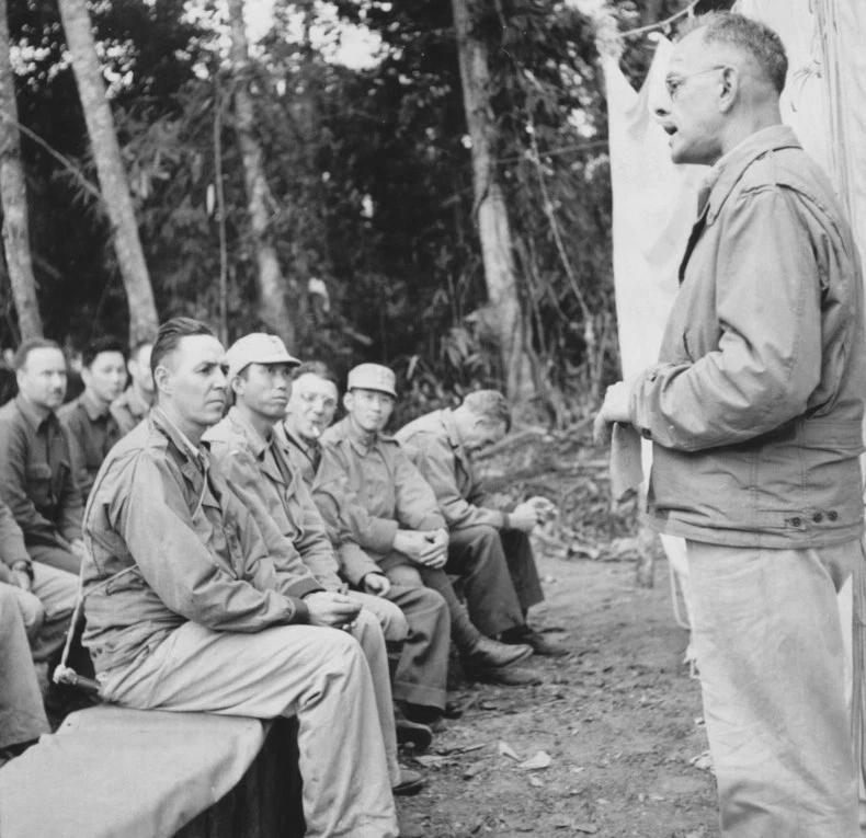 US Army Medical Corps doctor Colonel Gordon Seagraves speaking to US and Chinese officers, Ningam Sakan, northern Burma, 24 Dec 1943