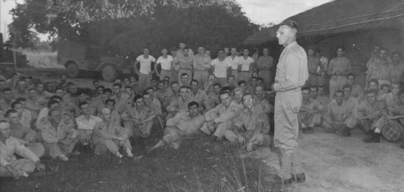 Lieutenant General Joseph Stilwell speaking to personnel of 2nd Troop Carrier Squadron, Assam, India, 15 Jul 1944