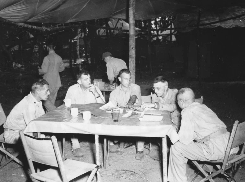 Major Nellus Rhodes, Colonel Carlton Smith, Colonel Rothwell Brown, Lieutenant General Joseph Stilwell, and General Liao Yaoxiang at Liao's headquarters about six miles south of Laban, Burma, 28 Apr 1944