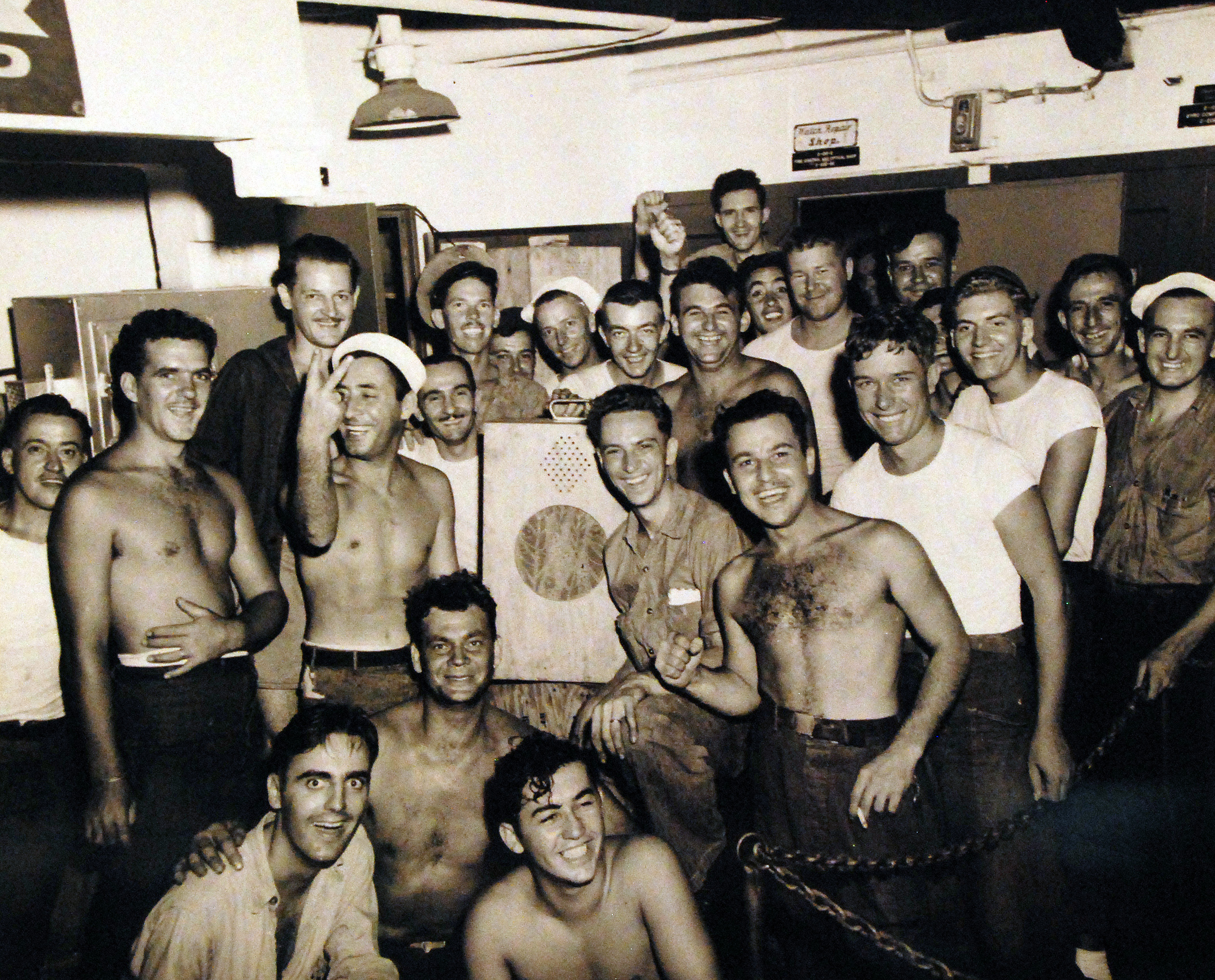Victory celebration aboard USS Oahu while at Eniwetok, Marshall Islands, 15 Aug 1945