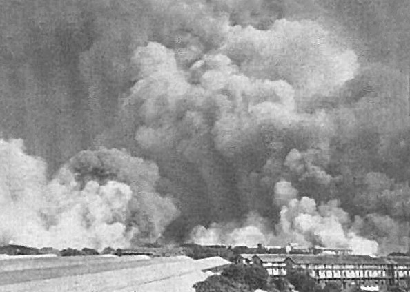 Smoke rising from Victoria Dock, Bombay, India during the cargo ship Fort Stikine explosion, 14 Apr 1944