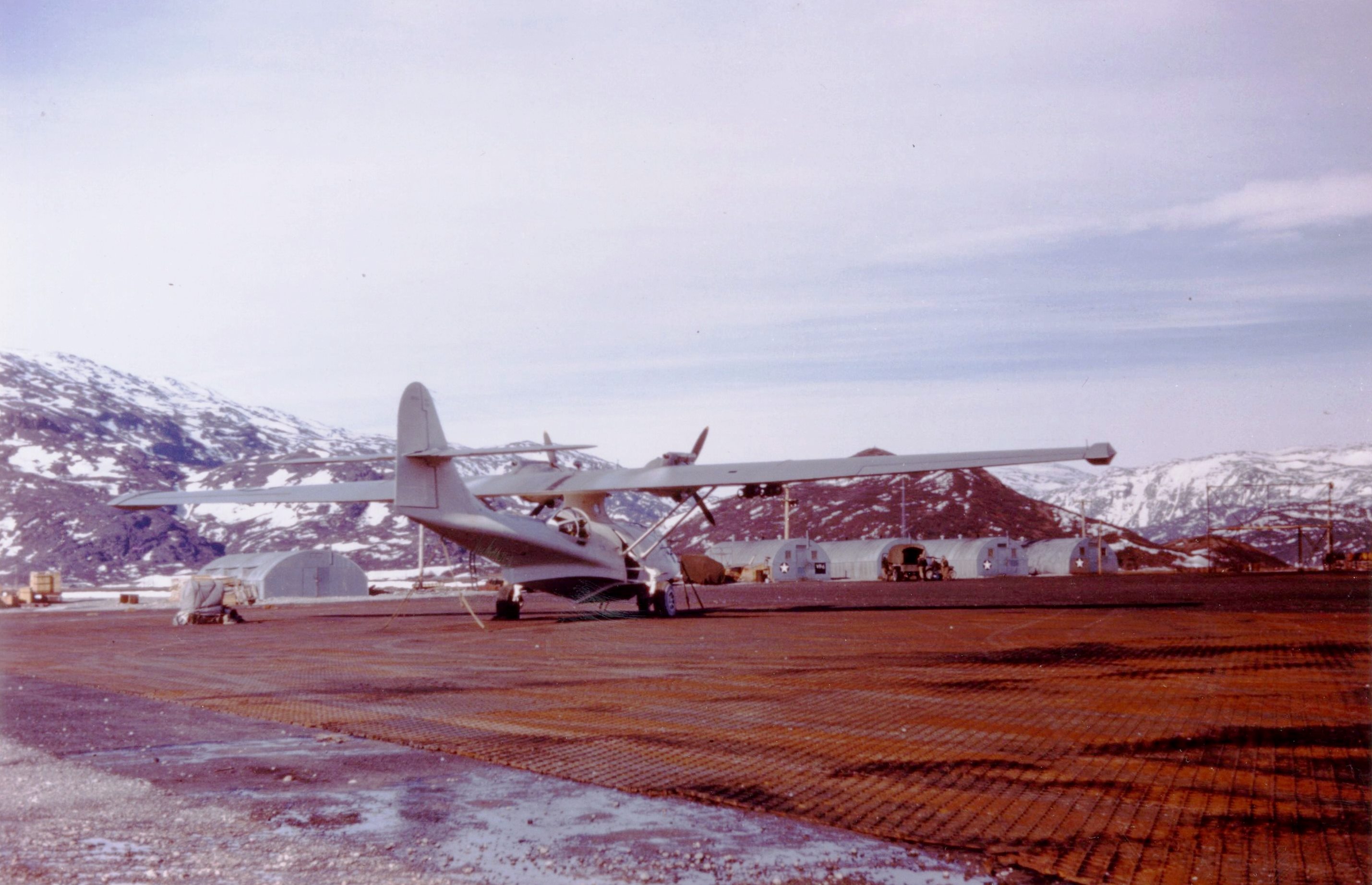 United States Coast Guard PBY-5A Catalina with Patrol-Bombing Squadron 6 on the ramp at Bluie West One air strip, Narsarssuak, Greenland (now Narsarsuaq), 1943.