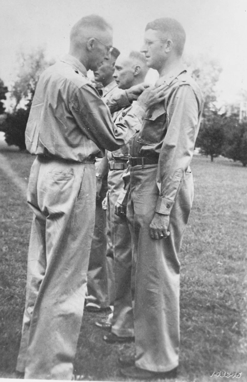 Lieutenant General Joseph Stilwell awarding the Purple Heart medal to Lieutenant Colonel Frank Merrill, India, 1942