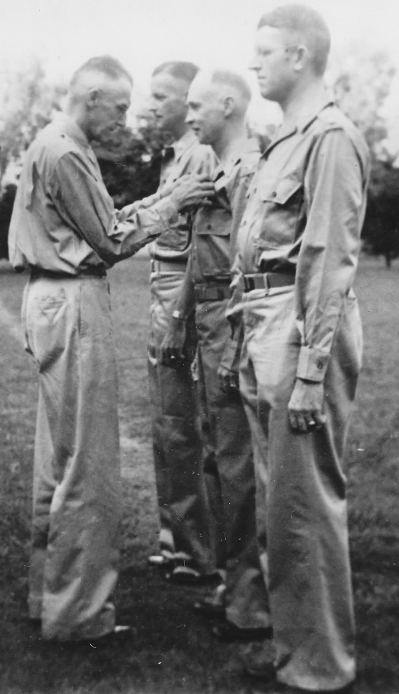 Lieutenant General Joseph Stilwell awarding the Purple Heart medal to Colonel Robert P. Williams, India, 1942