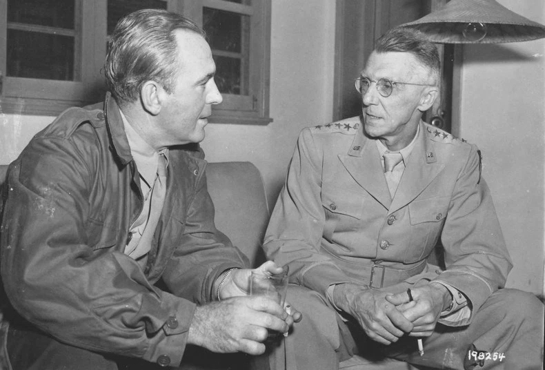 Film actor Pat O'Brien speaking with General Joseph Stilwell, China, 21 Oct 1944