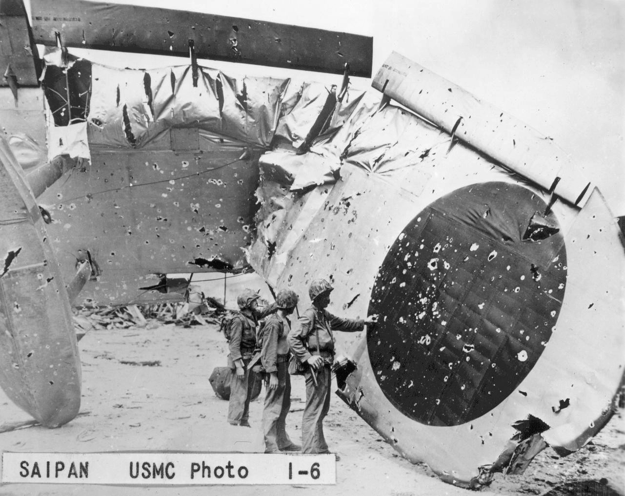 US Marines inspecting destroyed Japanese H8K flying boat, Saipan, Mariana Islands, Jun-Jul 1944