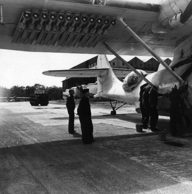PBY-5A Catalina of Patrol Squadron VP-63 at Pembroke Dock, South Wales, United Kingdom, late 1943. Note backward firing anti-submarine rockets, part of their new Magnetic Anomaly Detection warfare.