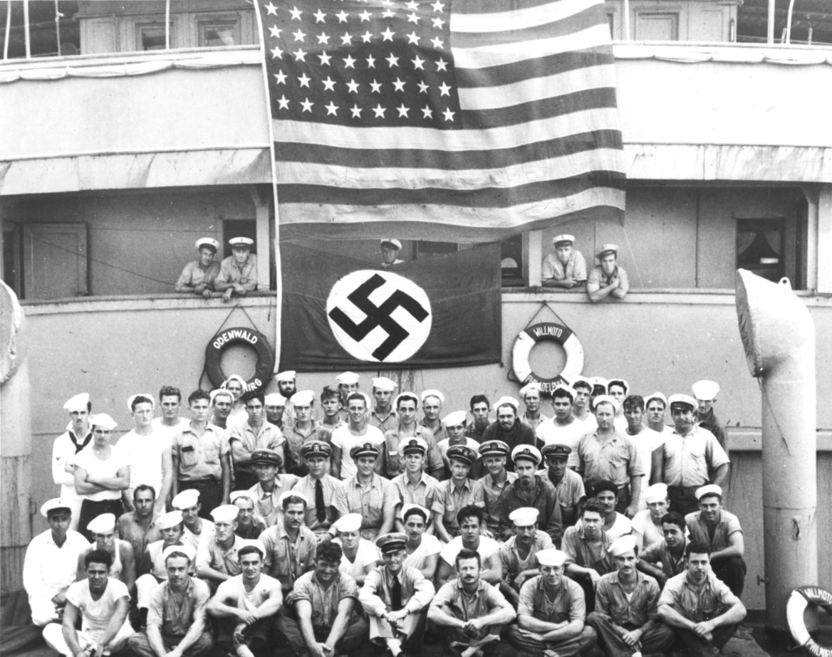 US Navy prize crew aboard the seized German blockade runner Odenwald in the South Atlantic, 6 Nov 1941. The Odenwald had been disguised as the US-flag ship Willmoto carrying rubber from Japan to Germany.