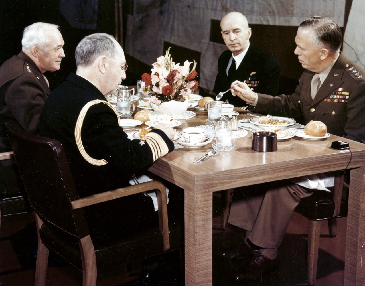 A luncheon meeting of the Joint Chiefs of Staff, Washington DC, circa 1943. Left to Right: General Henry H Arnold, Admiral William D Leahy, Admiral Ernest J King, and General George C Marshall.