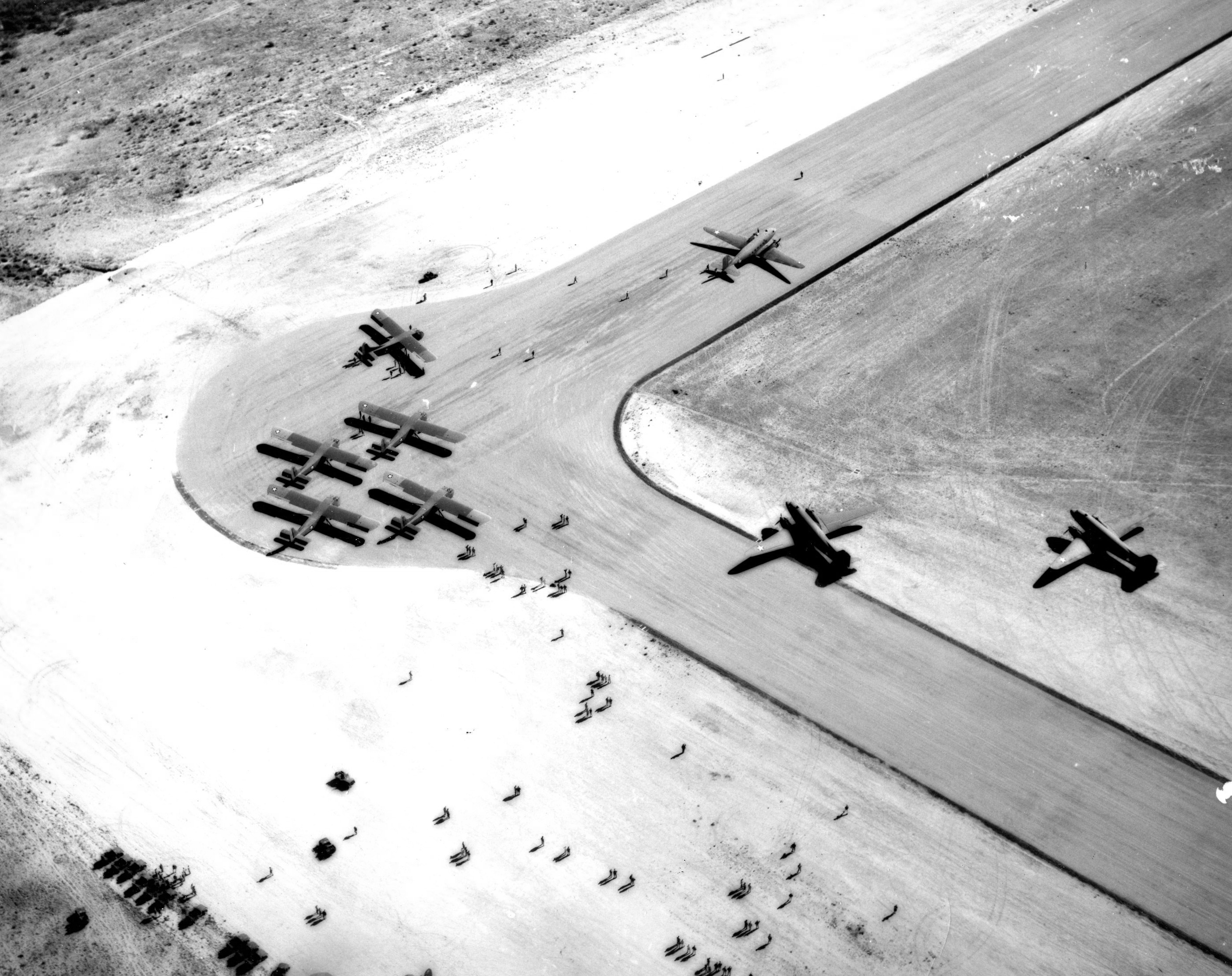Aerial view of a glider training airstrip in Texas, 1943. Visible are C-47 Skytrain tow planes with Waco CG-4A gliders. Photo 5 of 5