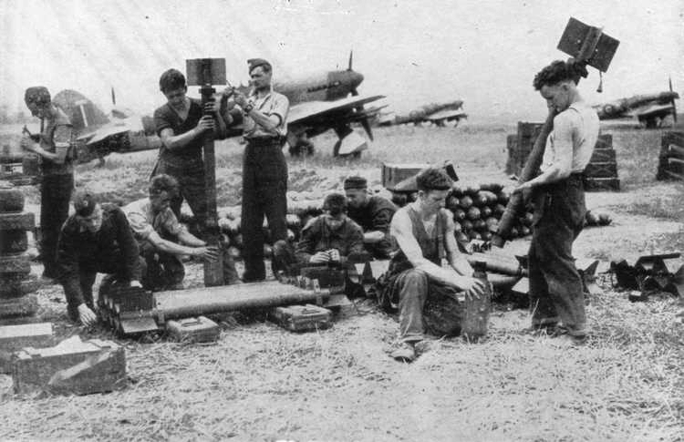 Rockets being prepared for Typhoon fighters, RAF Newchurch, southern England, United Kingdom, 1943-1944