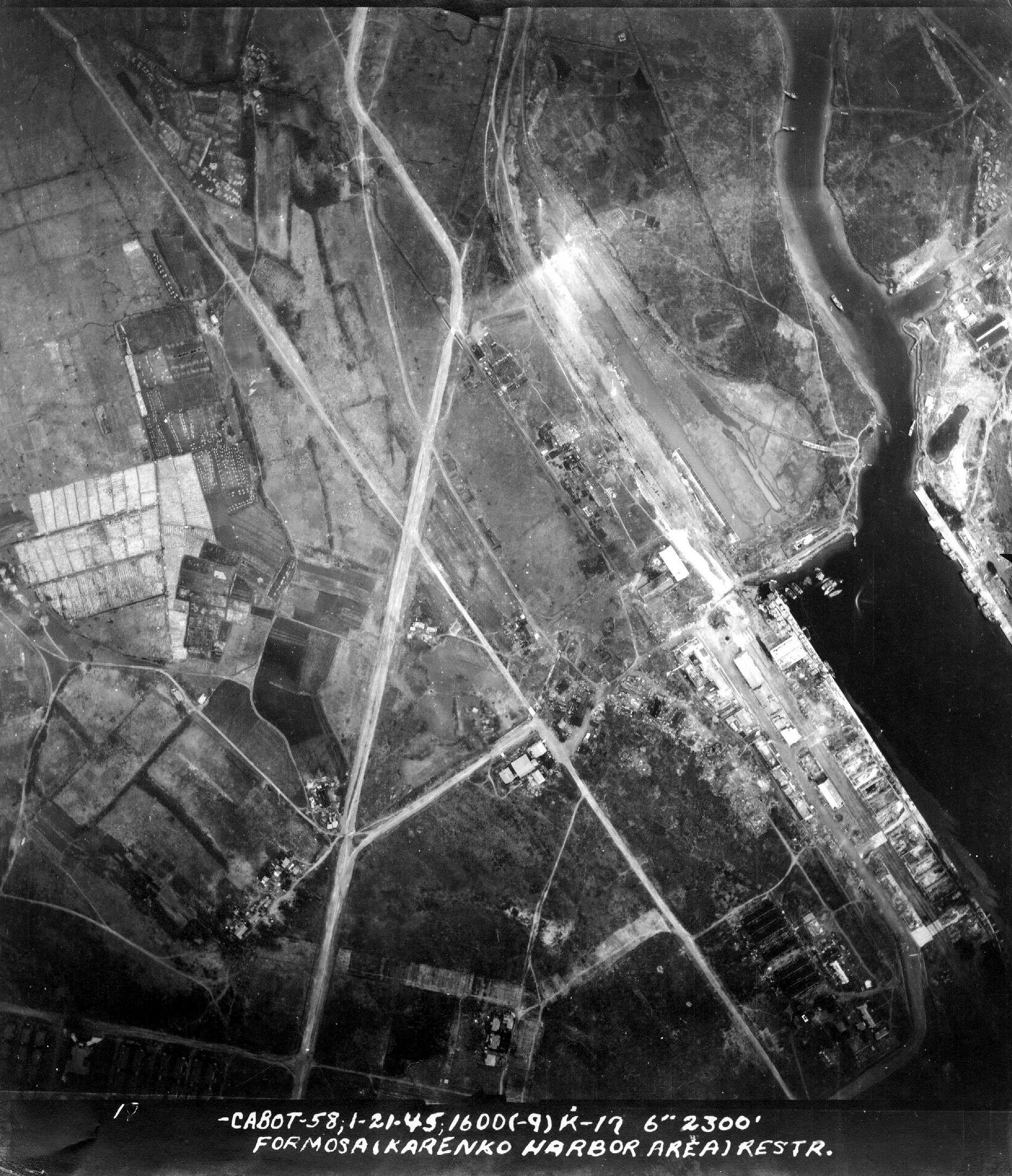 Aerial reconnaissance photo of Karenko Harbor (now Hualien), Taiwan, 21 Jan 1945. Photo taken from an aircraft from the USS Cabot.