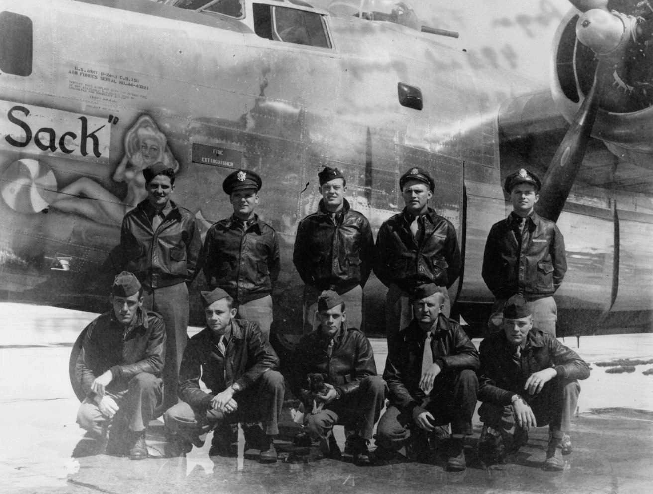 B-24J bomber 'Old Sack' and crew, of USAAF 493rd Bombardment Group, at RAF Debach, England, United Kingdom, spring 1944