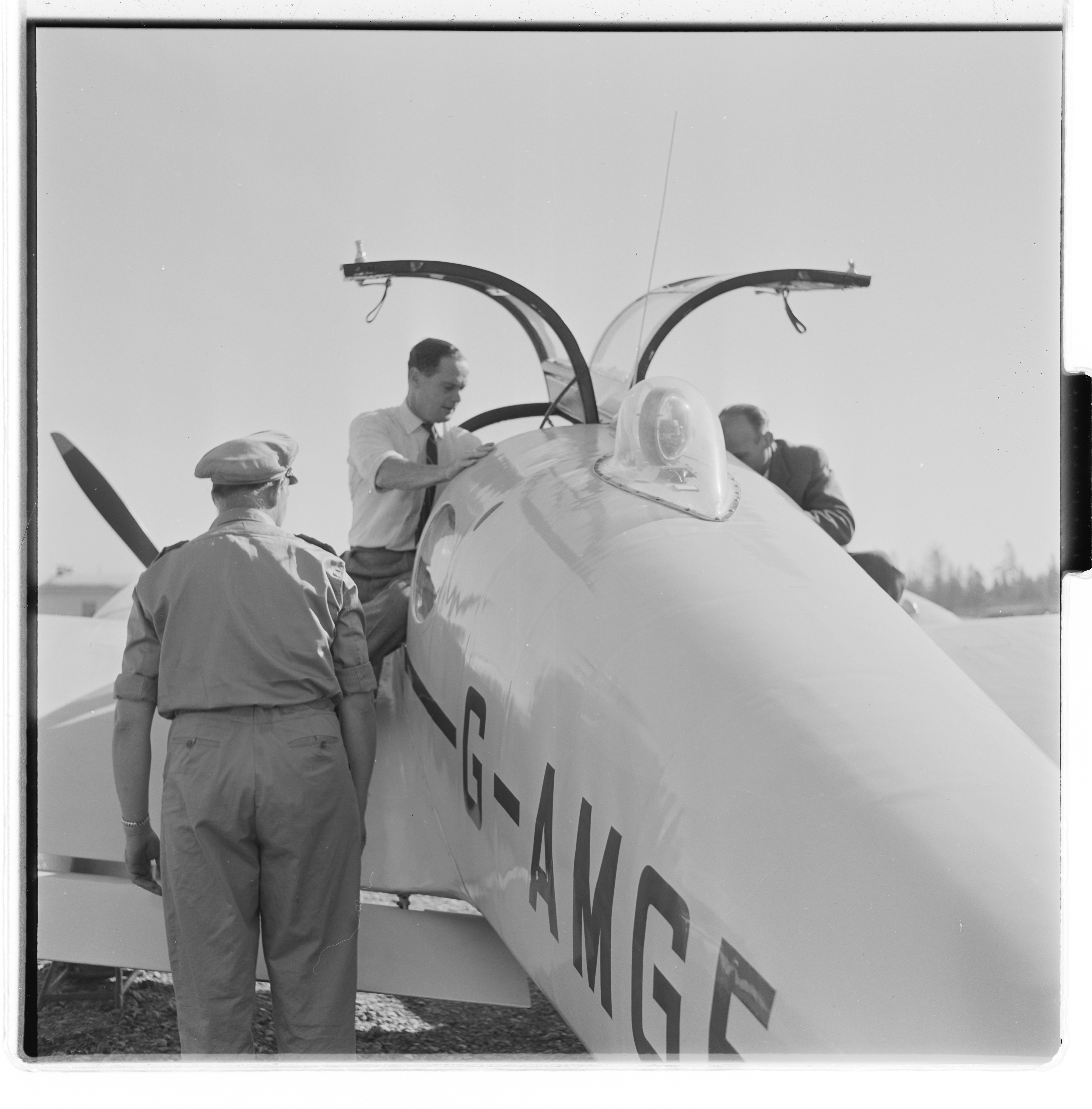 Douglas Bader inspecting a Norwegian Gemini aircraft, Fornebu, Bærum, Akershus, Norway, 1955, photo 7 of 8