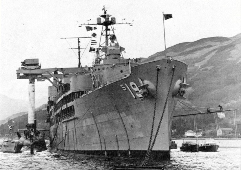 USS Proteus transferring a Polaris missile to USS Patrick Henry, Holy Loch, Scotland, United Kingdom, 1961, photo 1 of 2
