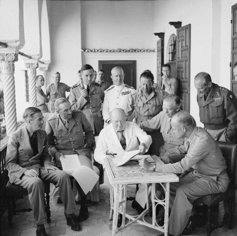 Winston Churchill presiding over the Allied Planning Conference, Algiers, Algeria, 4 Jun 1943; note Eden, Brooke, Tedder, Cunningham, Alexander, Marshall, Eisenhower, and Montgomery