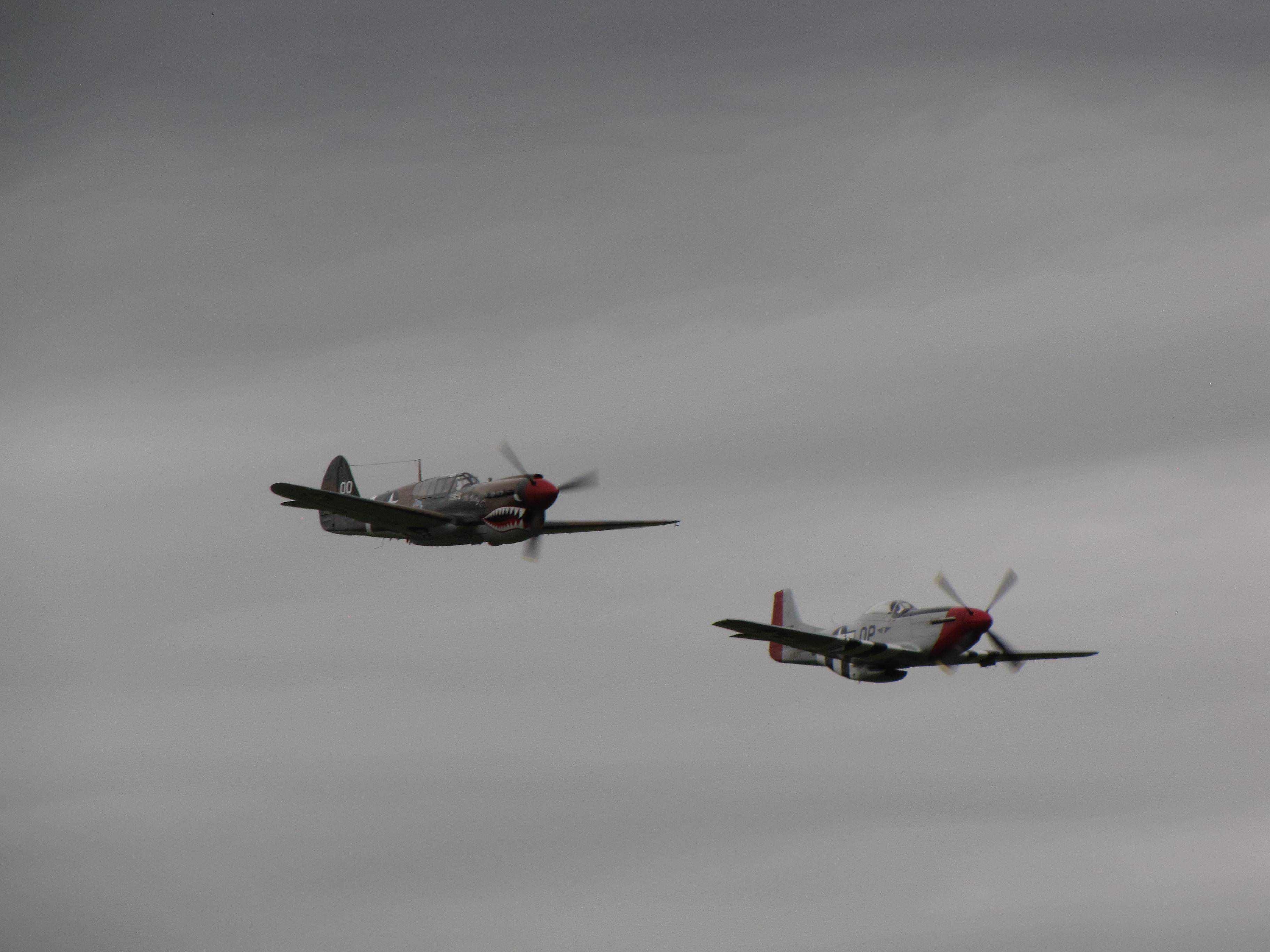 P-40 Kittyhawk and P-51 Mustang fighters in flight, Reading Regional Airport, Pennsylvania, United States, 3 Jun 2018