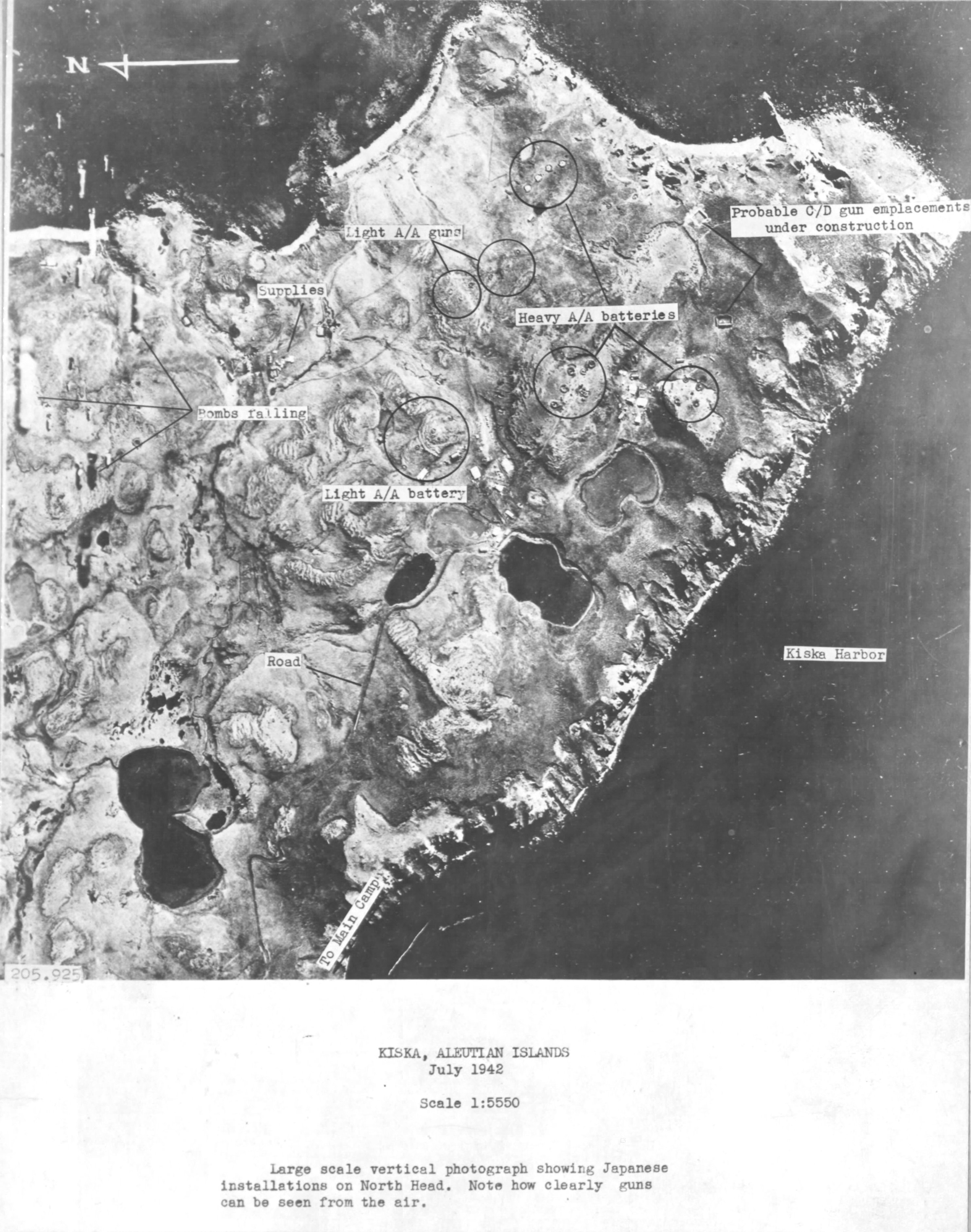 Aerial photograph of North Head Kiska Harbor, Kiska Island, Alaska during a bombing mission, 17 Jul 1942. Note the notations made by the photo analysts.