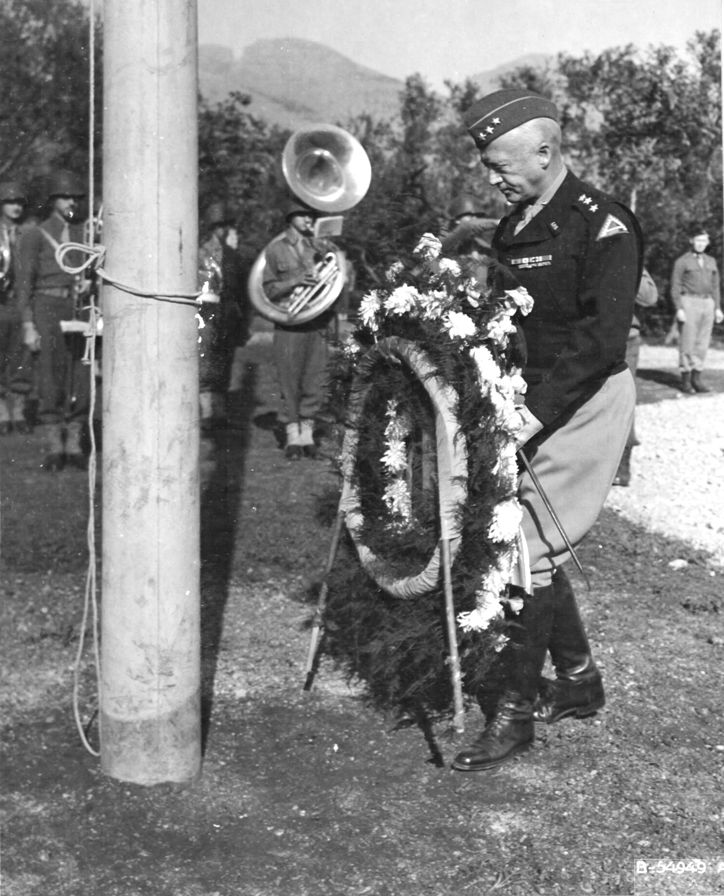 United States Army LtGen George Patton placing a wreath at the Palermo American War Cemetery, Palermo, Sicily on 11 Nov 1943 during World War I Armistice Day ceremonies.
