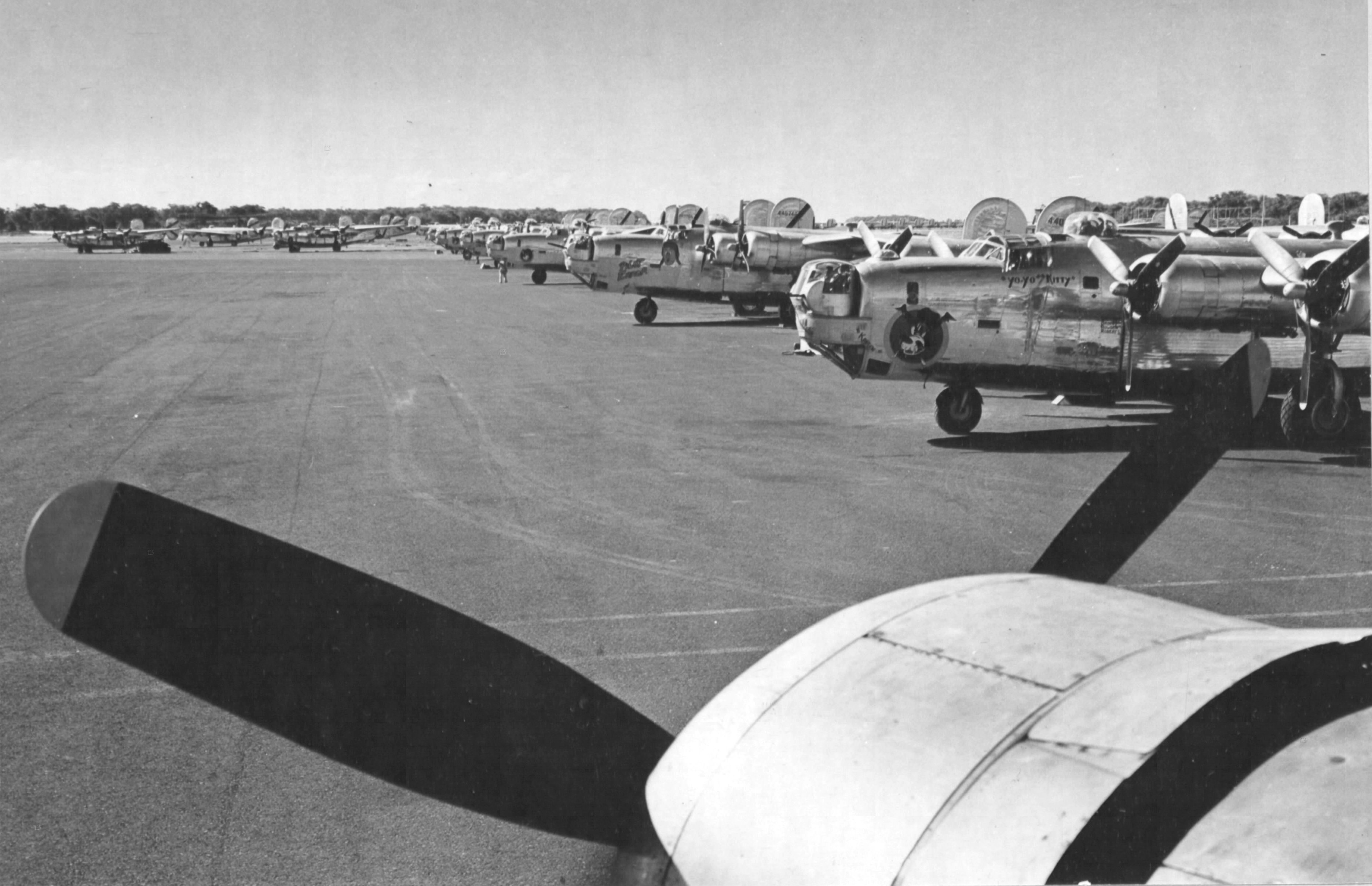 B-24 Liberator bombers of the 494th Bomb Group lined up at Barking Sands Airstrip, Kauai, Hawaii, 10 Oct 1943 just before their move to the Caroline Islands.