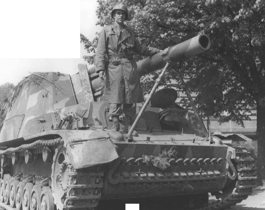 US 69th Infantry Division Captain Hans Trefousse posing with a SdKfz 165 self-propelled gun that he had captured by persuading the German crew to surrender on 25 Apr 1945, near Wurzen, Sachsen, Germany