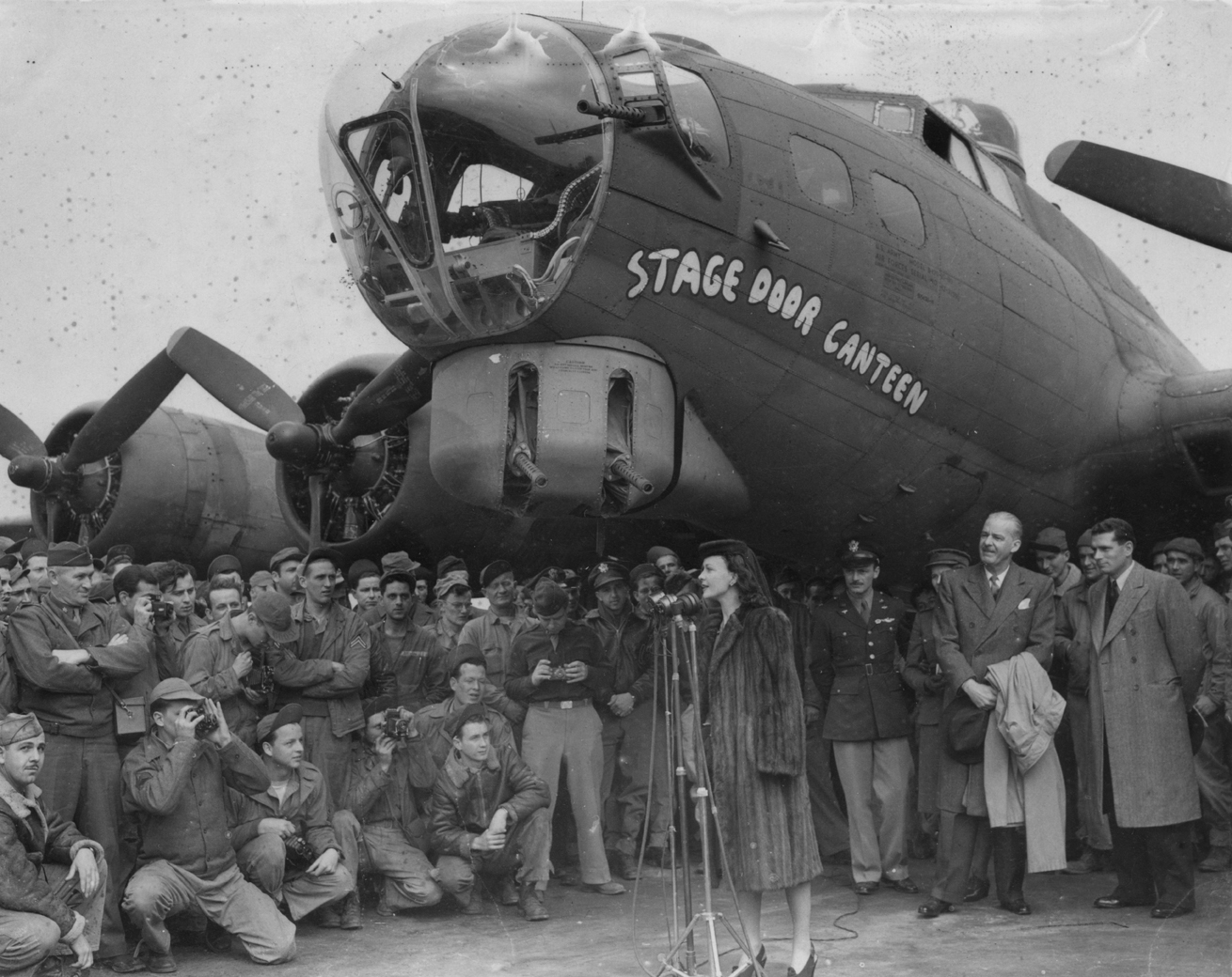 Actress Vivian Leigh speaks to the 381st Bomb Group at Ridgewell, Hallstead, UK during the christening ceremonies for B-17G “Stage Door Canteen,” 21 Apr 1944. Also present were actors Alfred Lunt and Laurence Olivier.