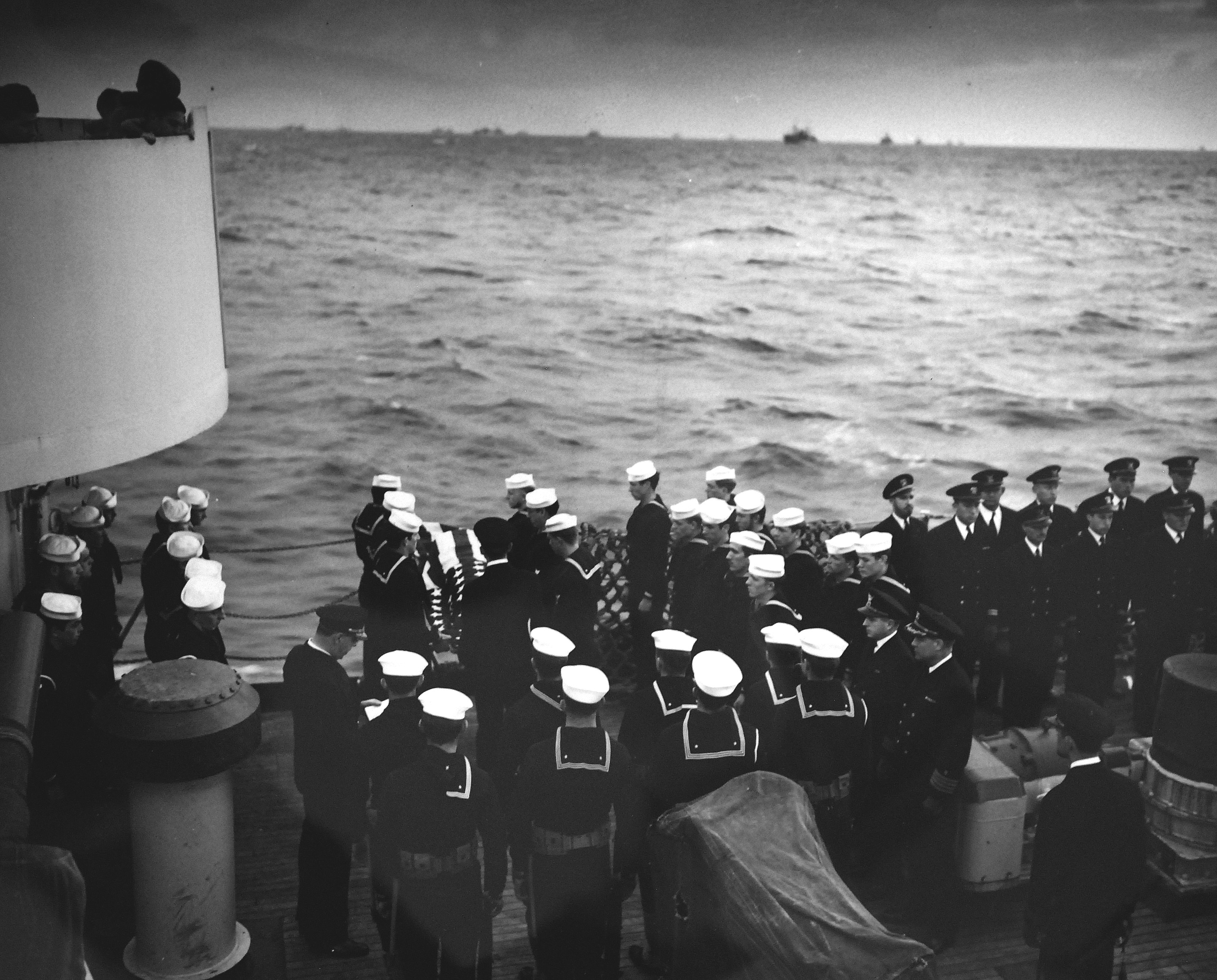Funeral services aboard United States Coast Guard cutter Spencer 18 Apr 1943 for sailor killed in action against U-175 the day before in the North Atlantic.