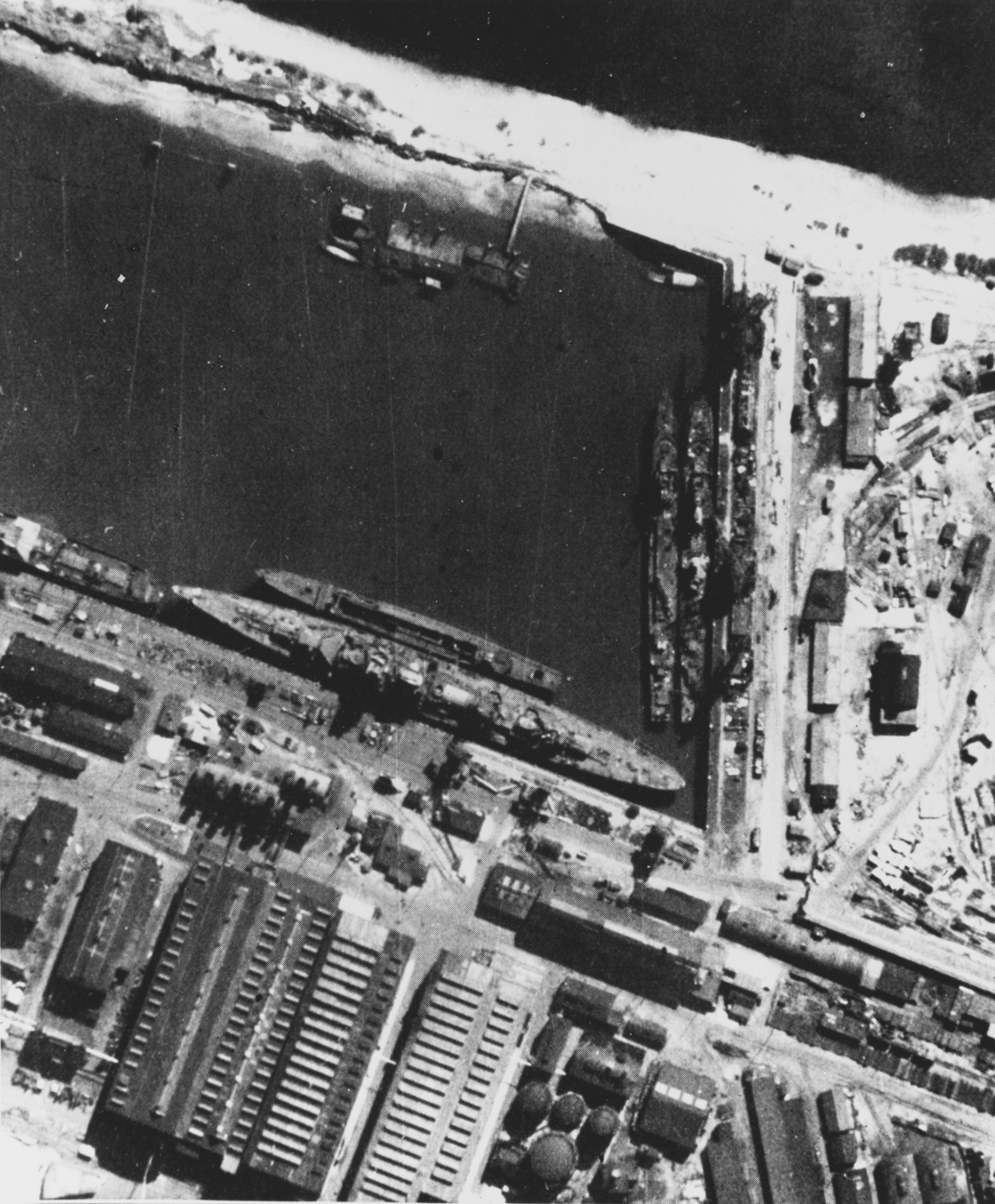 Aerial view of Seydlitz, Z34, Z32, and Z33 in the Westhafen basin of Deschimag shipyard, Bremen, Germany, 8 May 1942