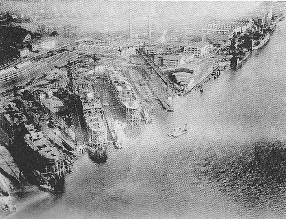 Overhead view of Bremer Vulkan slips and equipping pier, Bremen, Germany, date unknown
